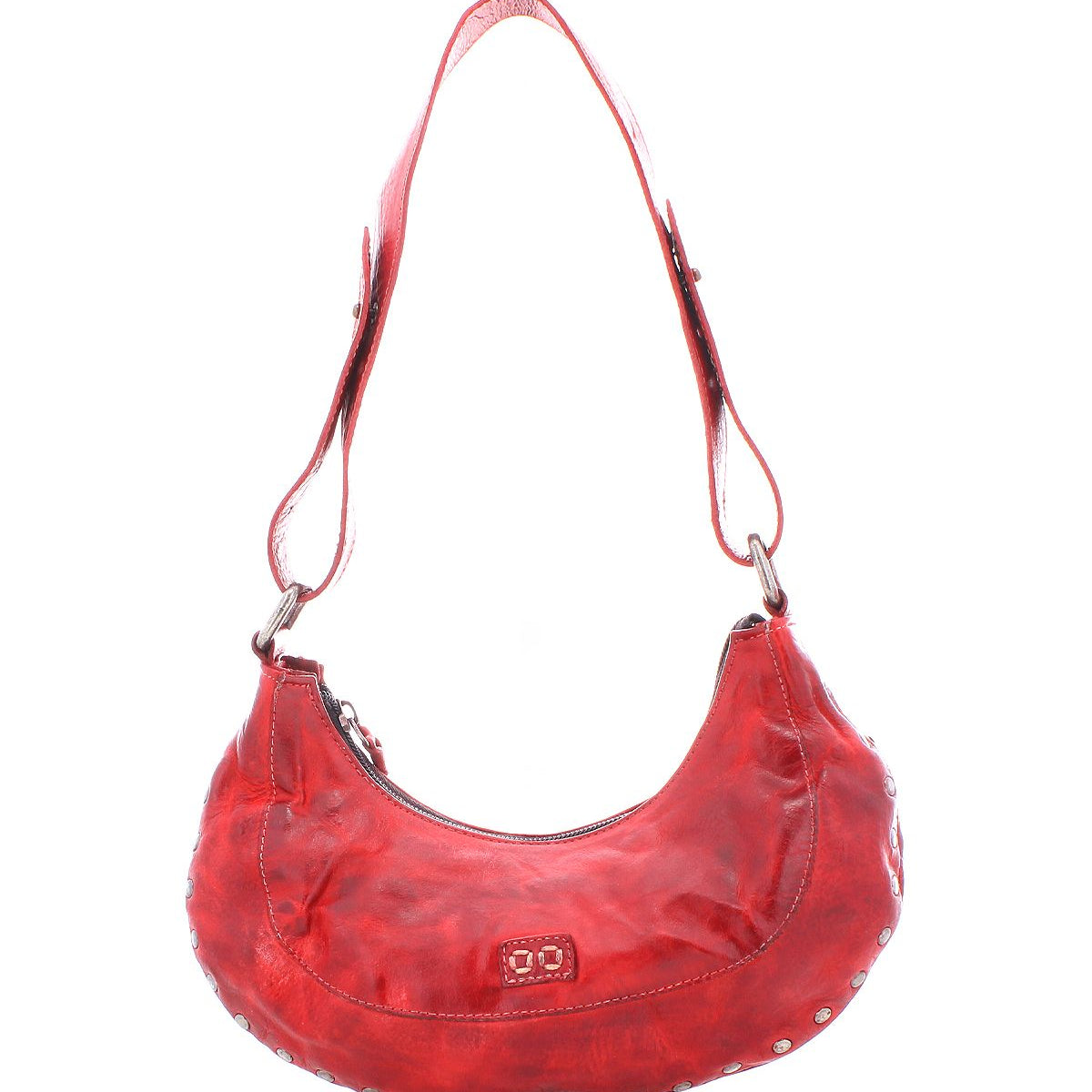 The Madre by Bed Stu is a red leather shoulder bag featuring a distinct crescent shape and adorned with metal studs, capturing a rock ‘n’ roll vibe. It includes a zip closure and adjustable strap, making it an edgy statement piece for any outfit.