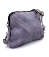 A purple leather crossbody bag with stitched details, called the Magdalene by Bed Stu.