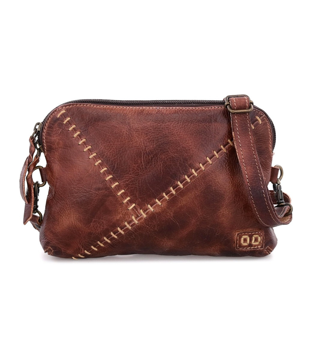 A brown leather Magdalene crossbody bag with stitched details by Bed Stu.