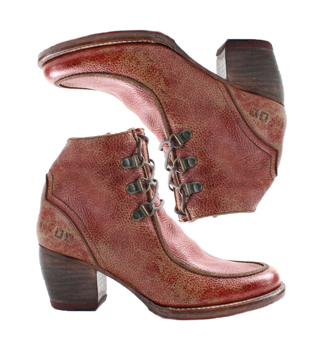 A pair of Bed Stu women's distressed red leather ankle boots.