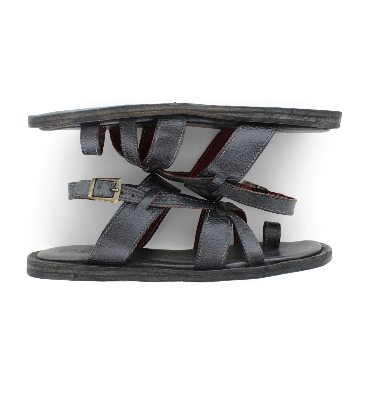 A pair of Bed Stu Manati II black leather sandals on a white background.