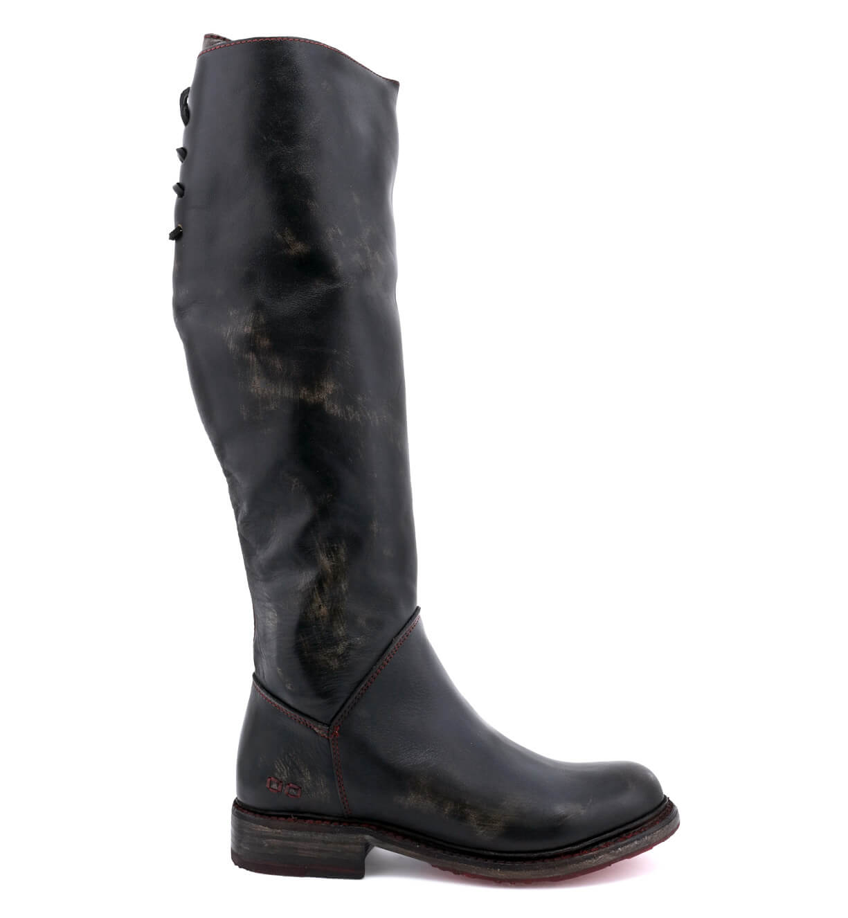 A women's Manchester boot by Bed Stu with a red sole.