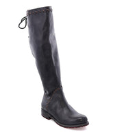 A women's black leather boot with lace detailing, the Manchester III by Bed Stu.