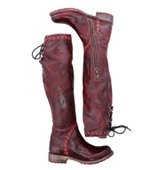 A pair of Bed Stu Manchester III women's red leather boots.