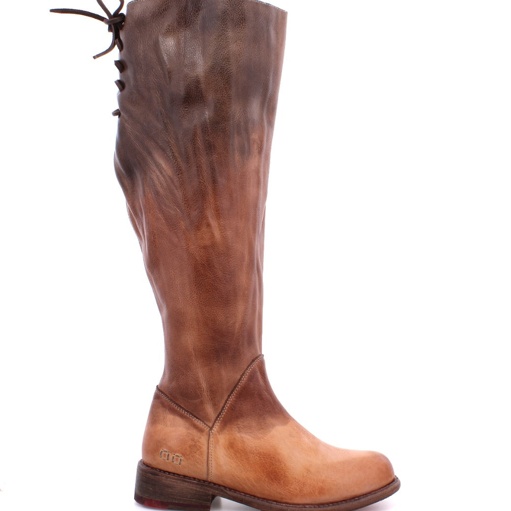 A women's Manchester Wide Calf boot with a brown leather sole by Bed Stu.