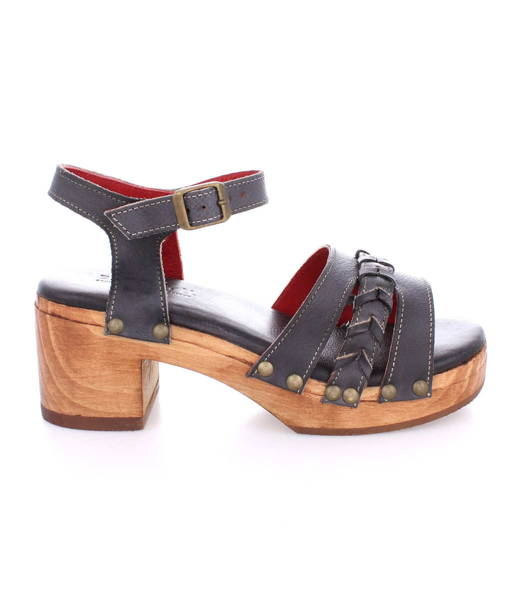 A women's black Bed Stu Mantis sandal with braided straps.
