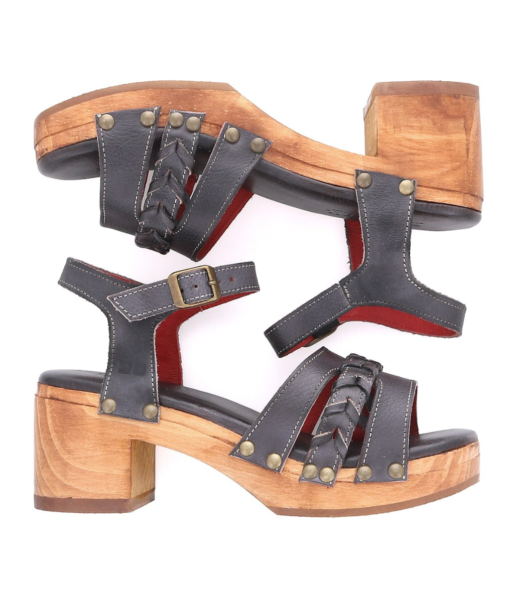 A pair of Mantis sandals by Bed Stu, with a black leather upper and a wooden heel.