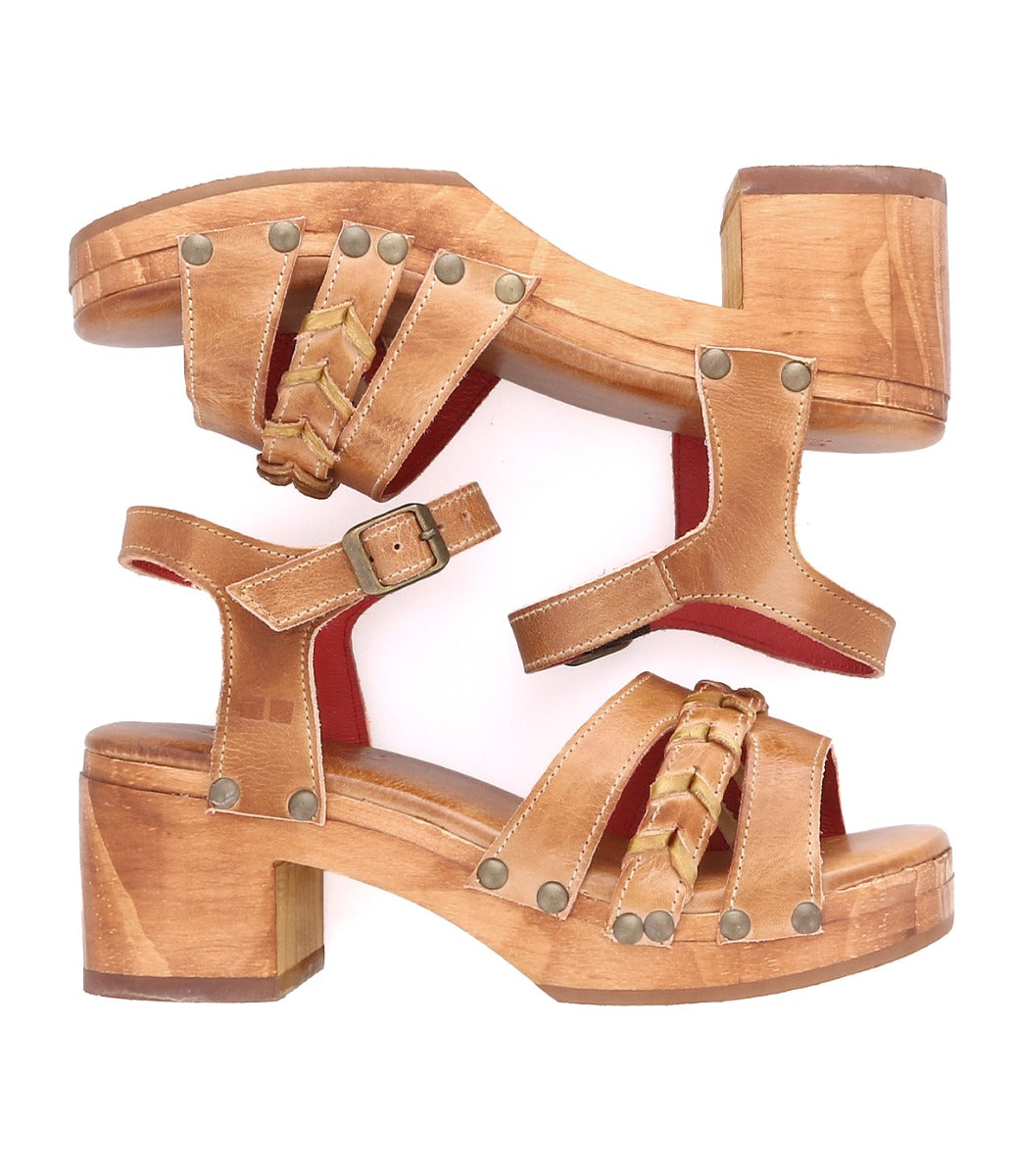 A pair of women's Bed Stu Mantis sandals with straps and a wooden heel.