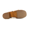 The back view of a women's Mantis sandal with a wooden sole by Bed Stu.