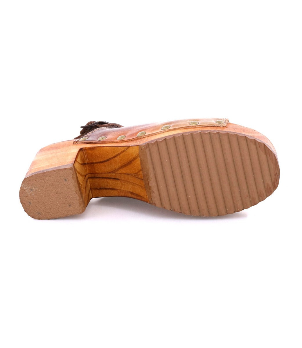A Marie shoe by Bed Stu with a wooden sole on a white background.