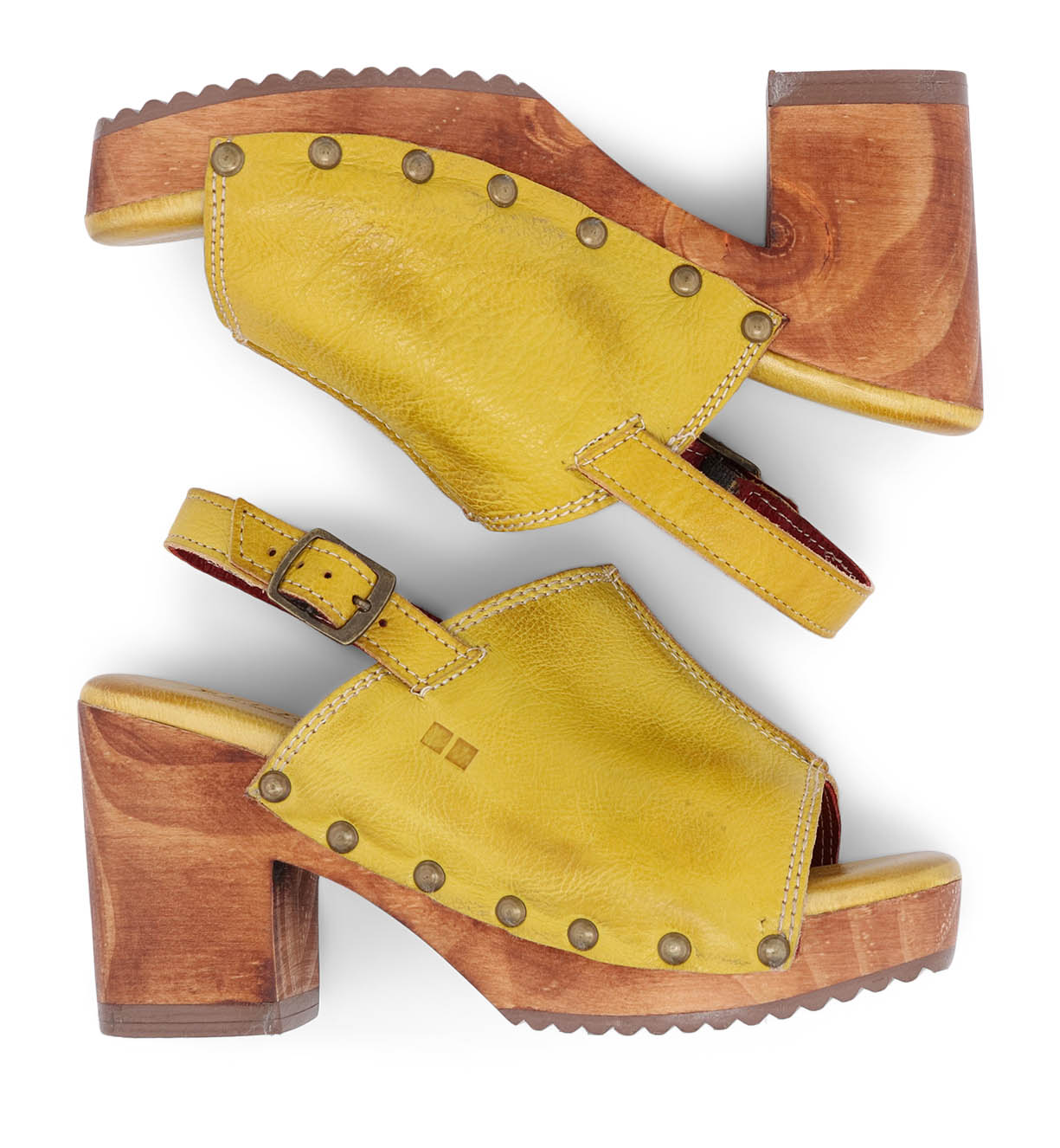 A pair of yellow Marie sandals with wooden heels by Bed Stu.