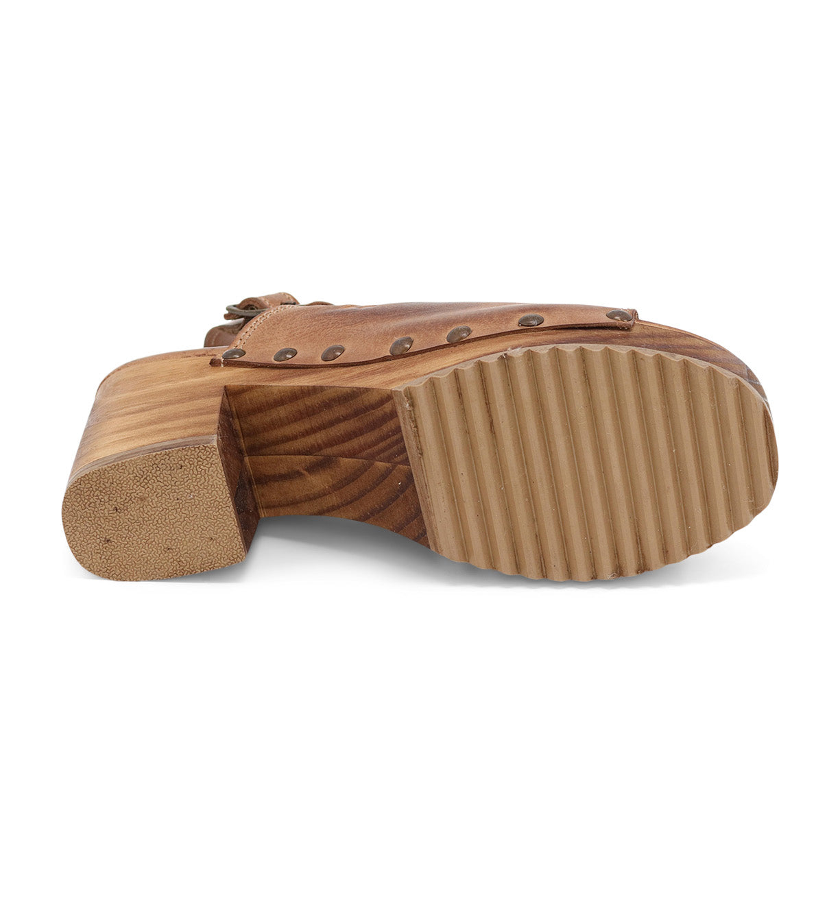 A pair of Marie brown shoes with studs on the sole by Bed Stu.