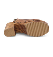 A pair of Marie brown shoes with studs on the sole by Bed Stu.
