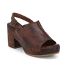 A women's brown leather clog with wooden heel, called Marie by Bed Stu.