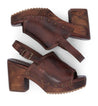 A pair of Marie women's brown leather sandals by Bed Stu.