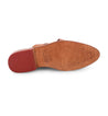 A pair of Bed Stu Mayra shoes with red soles on a white background.