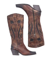 Introducing the Meadow by Bed Stu: a pair of brown cowgirl boots adorned with black flame-style detailing, featuring side zippers and chunky heels. These handcrafted leather boots exude western charm and durability.