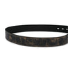 A Meander leather belt in black and brown on a white background, by Bed Stu.