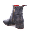 A Bed Stu Merryli women's ankle boot with a zipper on the side.