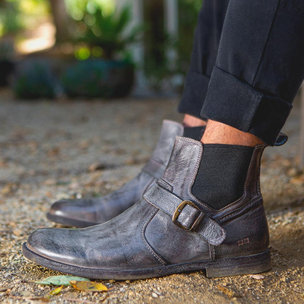 A man wearing a pair of Bed Stu Michelangelo grey leather chelsea boots.