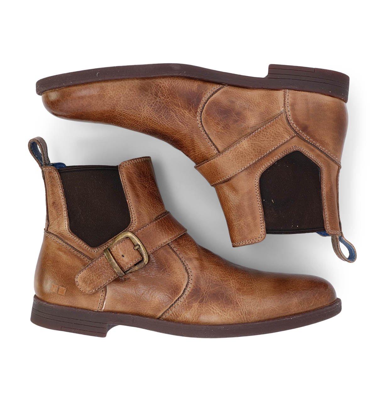 A pair of brown Michelangelo chelsea boots with buckles by Bed Stu.