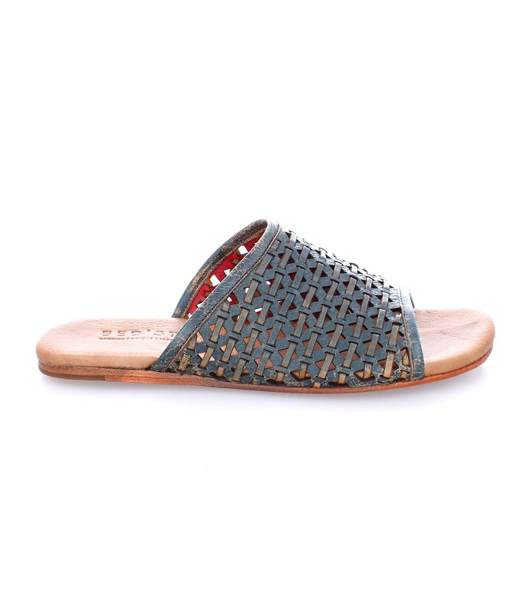 A pair of Minerva women's leather sandals by Bed Stu with a woven pattern.
