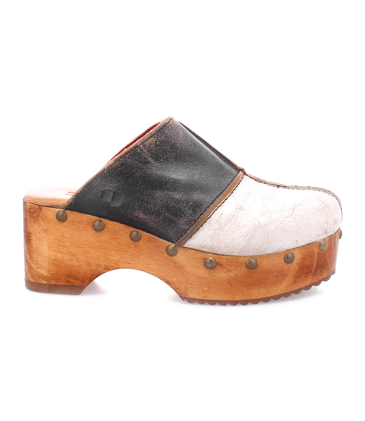 A sustainable women's Bed Stu Mista wood clog with black and white accents.