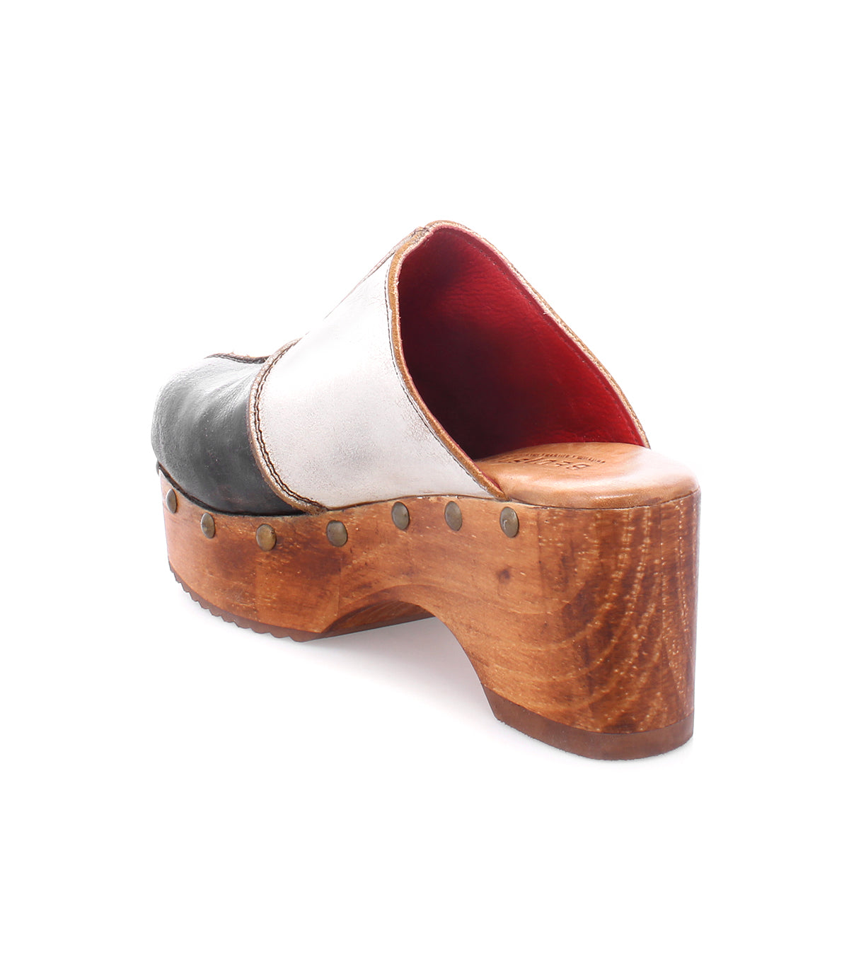 A sustainable wooden Mista clog for women with black and white stripes from Bed Stu.
