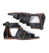 A pair of women's Miya black leather sandals by Bed Stu with straps and buckles.