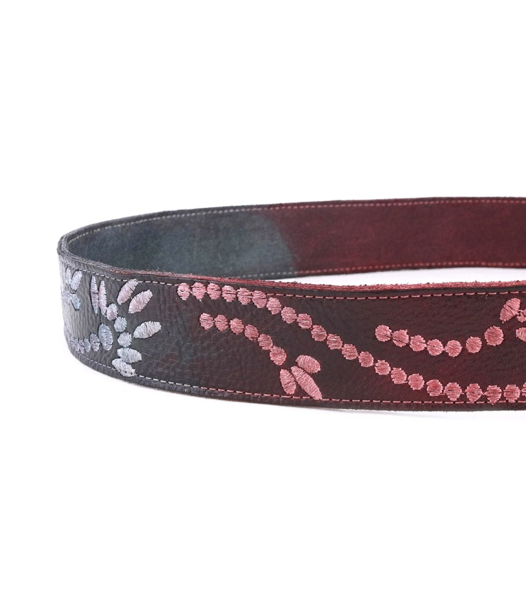 A Mohawk belt by Bed Stu with pink and black beads on it.