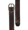 A Mohawk brown leather belt with a metal buckle by Bed Stu.