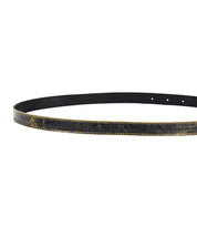 A close-up view of a Bed Stu Monae belt reveals its black, distressed leather featuring a worn, gold-speckled pattern.