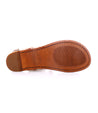 The back view of a women's Moon sandal with ankle buckles and tan soles