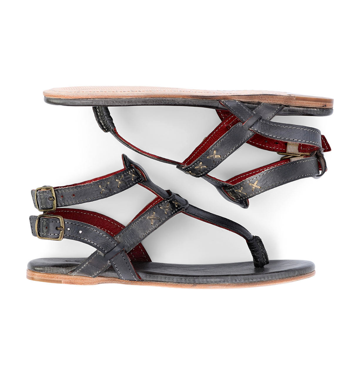 A pair of Moon women's leather sandals with red straps by Bed Stu.