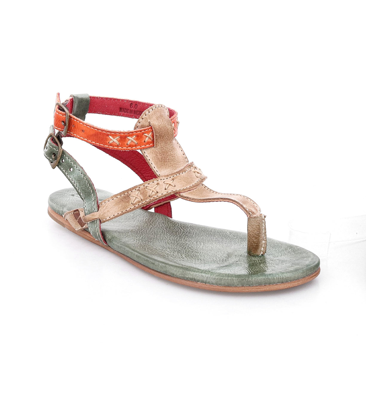A women's green and orange Moon sandal with straps by Bed Stu.