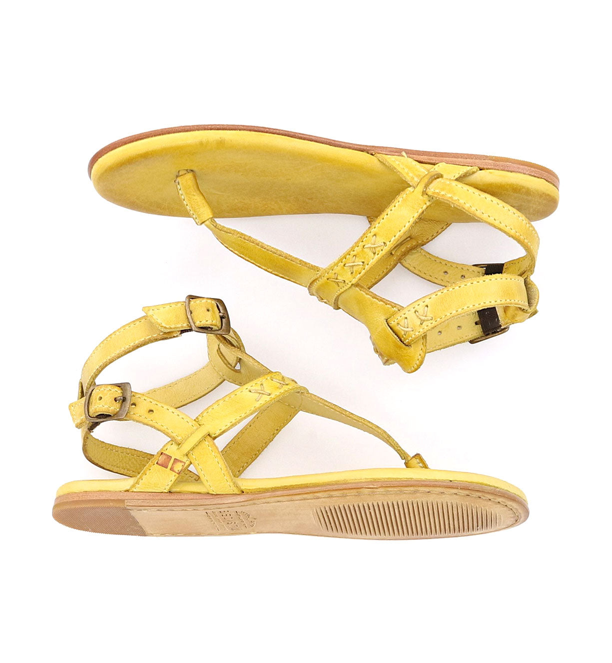 A pair of yellow Moon sandals on a white background. (Brand: Bed Stu)