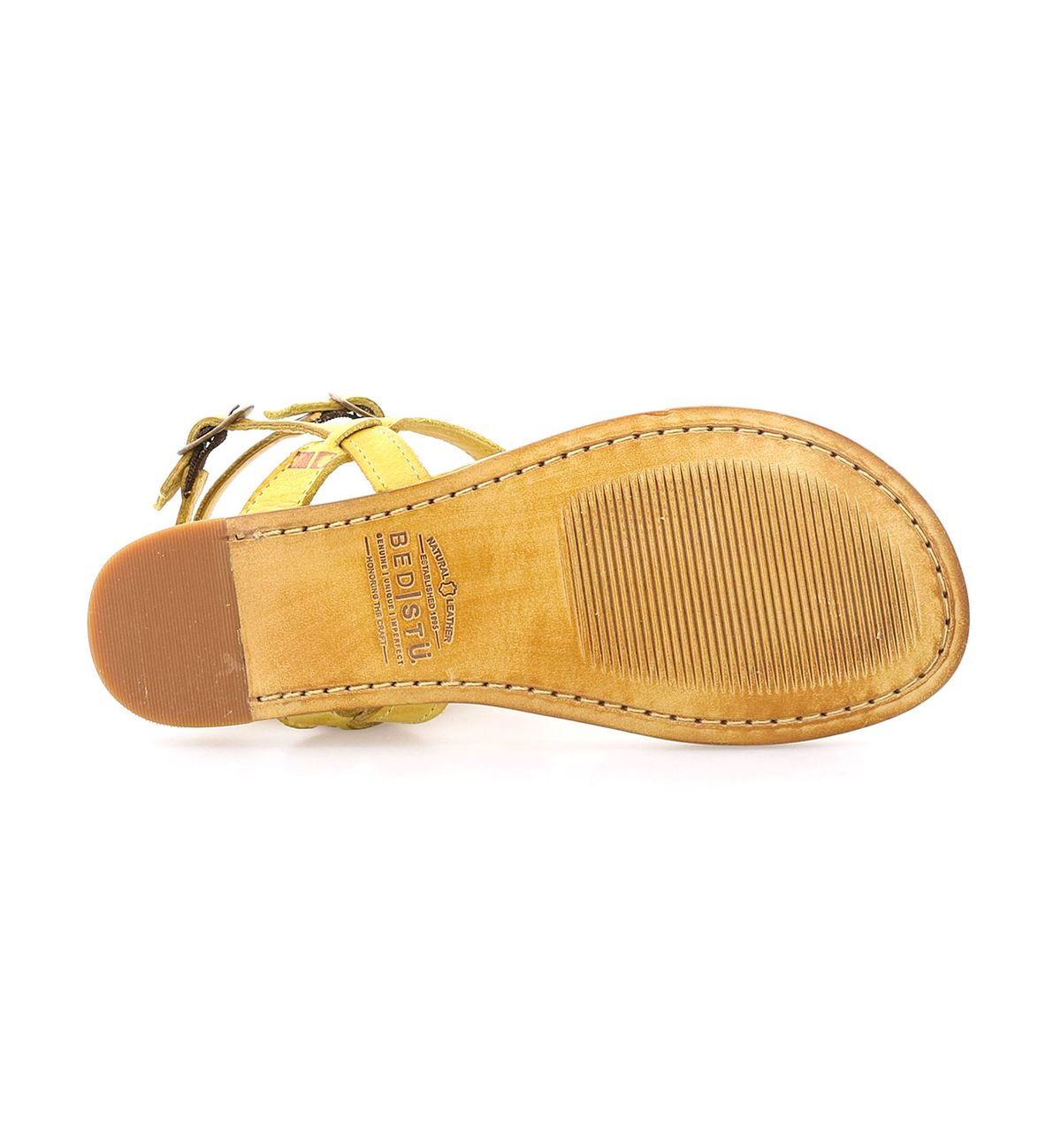 A pair of Moon yellow sandals on a white background by Bed Stu.