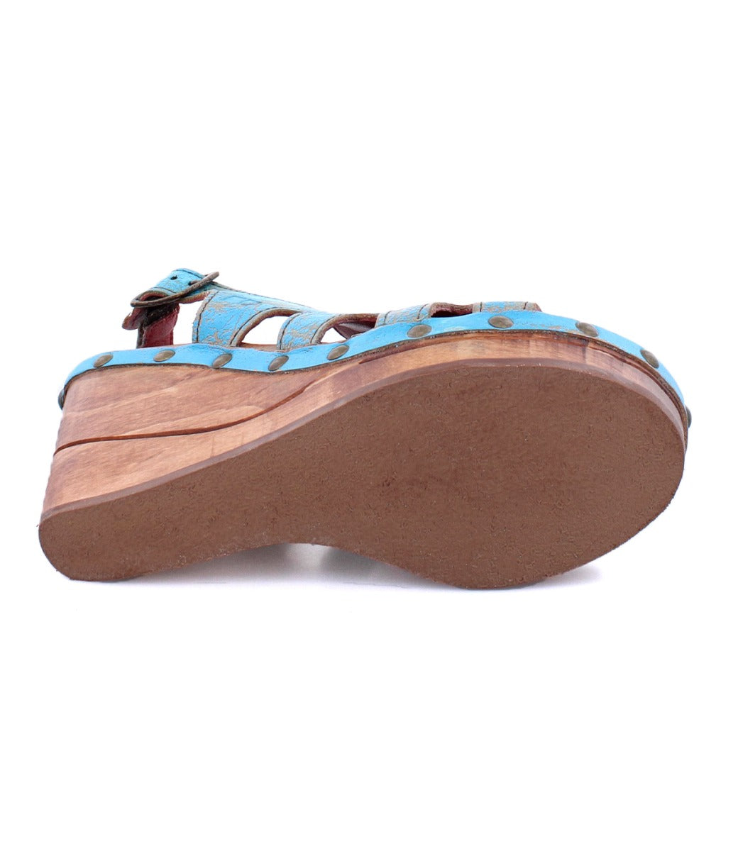 A pair of Bed Stu Naiya women's blue sandals on a white background.