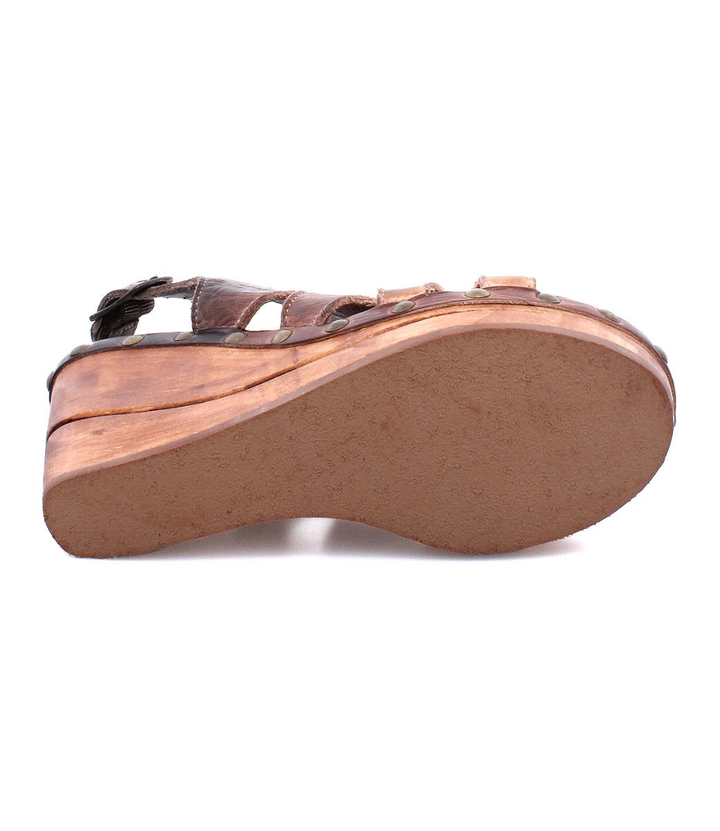 A women's Naiya wedge sandal with a wooden platform from the Bed Stu brand.
