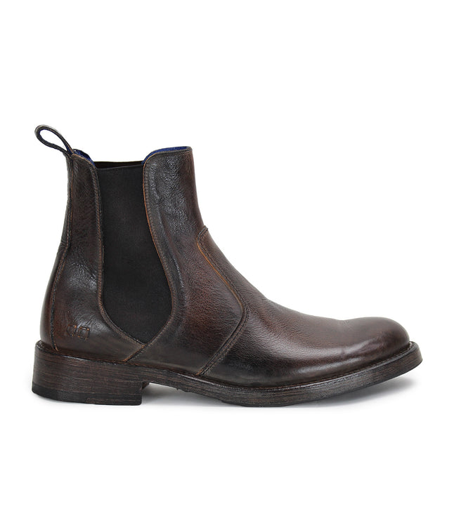 Classic Nando Chelsea boots shown on a white background with Bed Stu leather ankle boots.