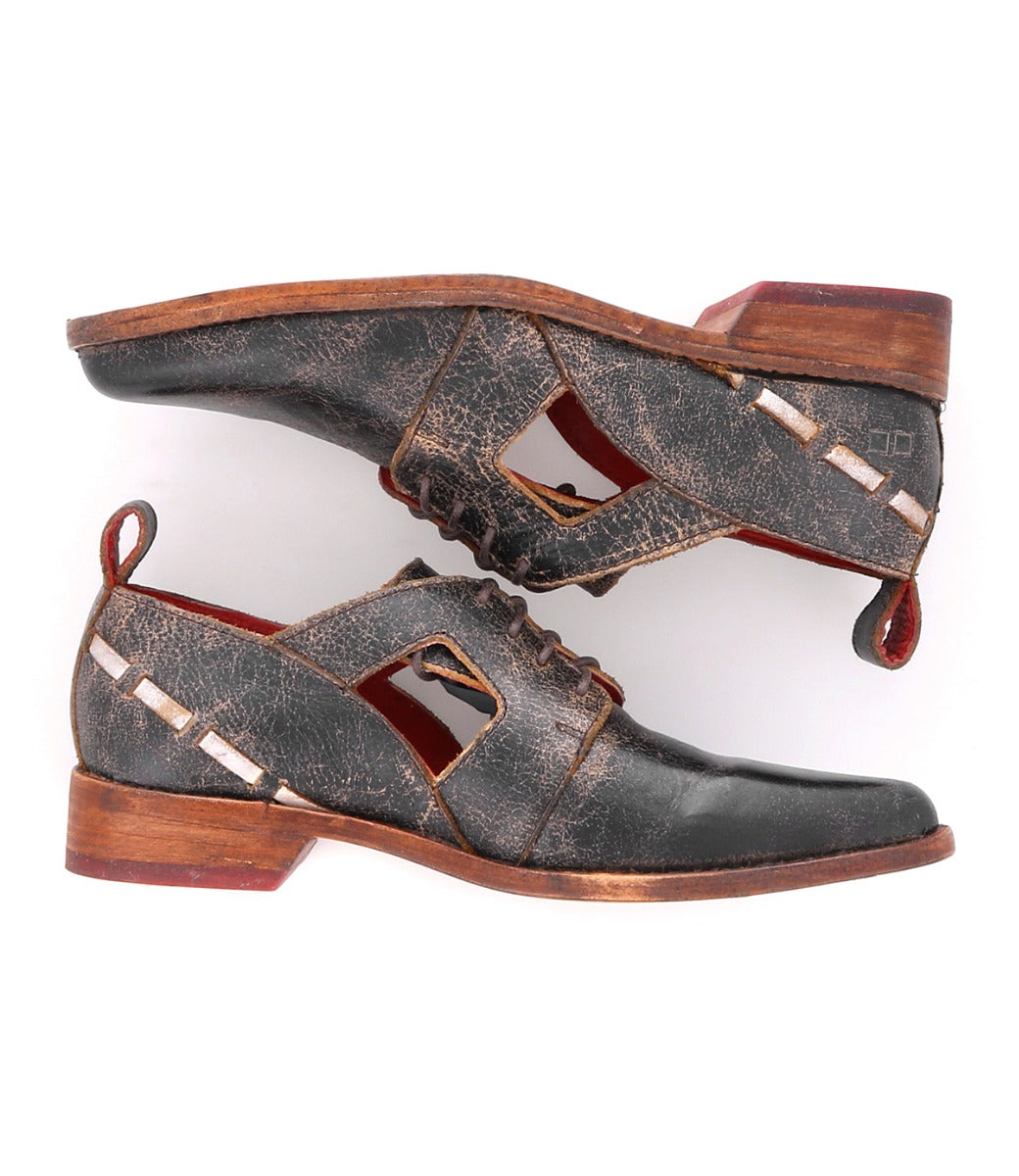 A pair of Neftis men's shoes with brown leather and wooden soles from Bed Stu.