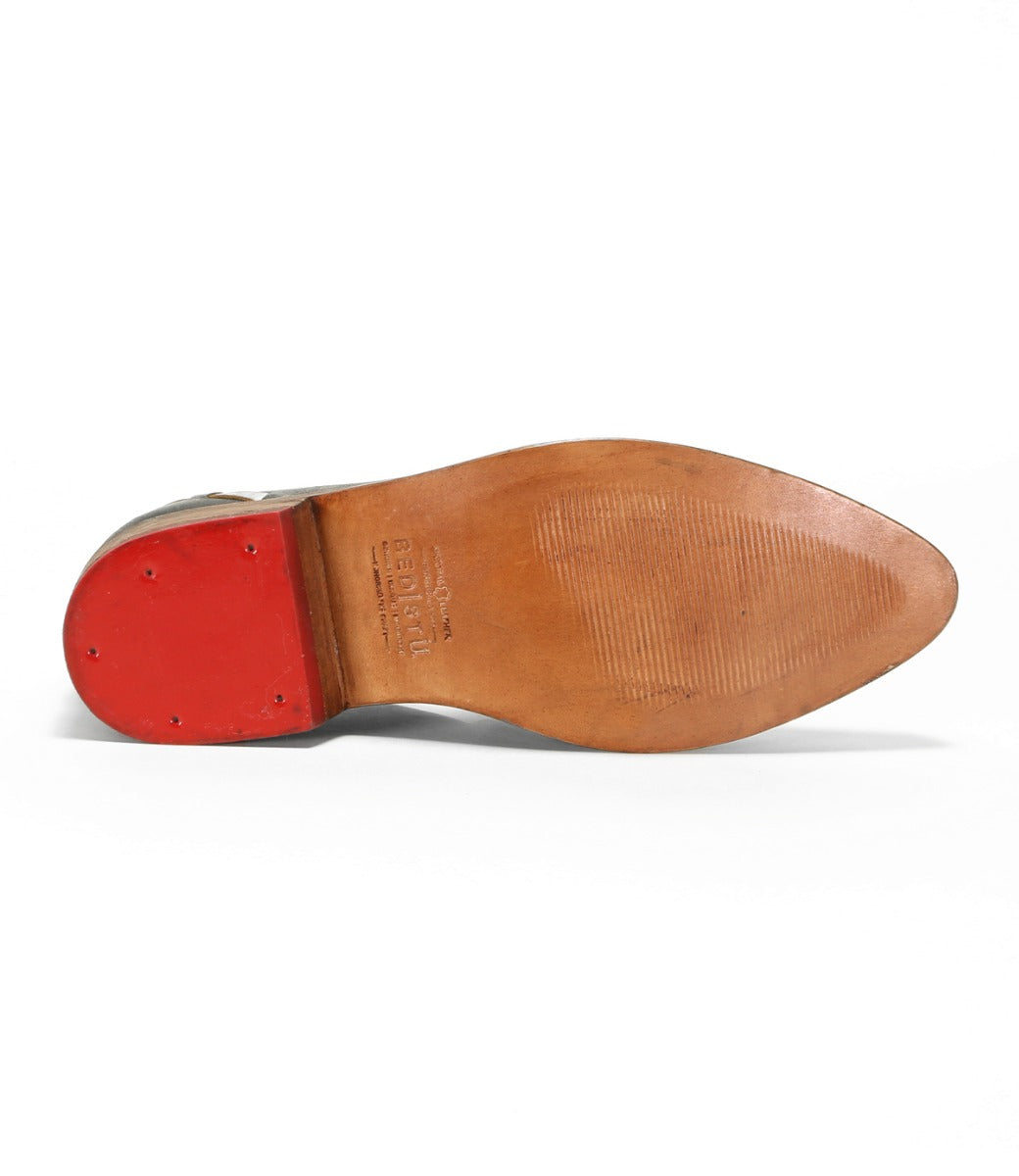 A pair of Neftis shoes with red soles on a white background from the Bed Stu brand.