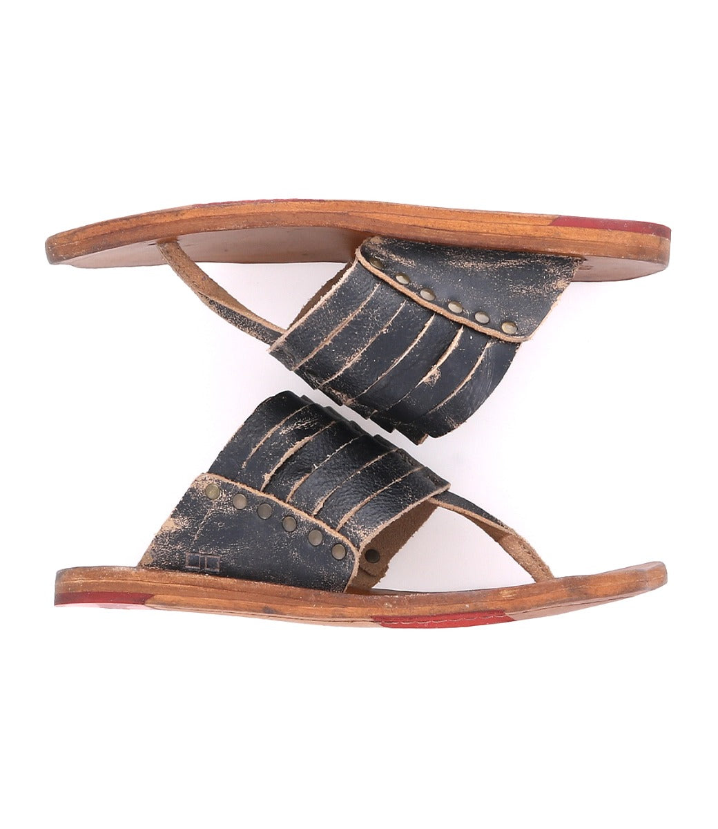 A pair of Nemesis by Bed Stu black leather sandals.