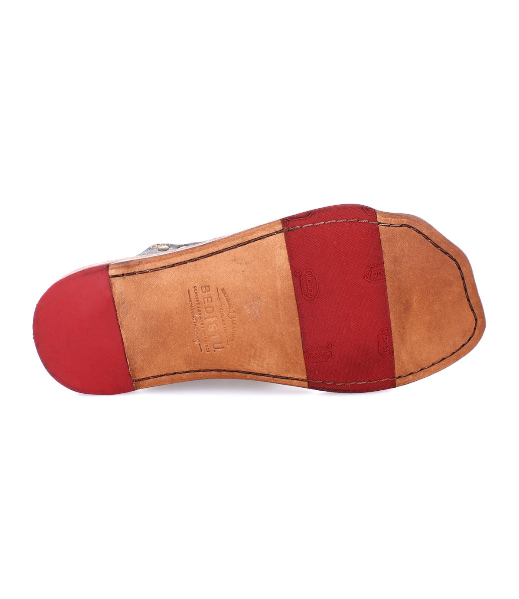 Sole of Bed Stu's Nemesis women's black leather flip flop sandals.