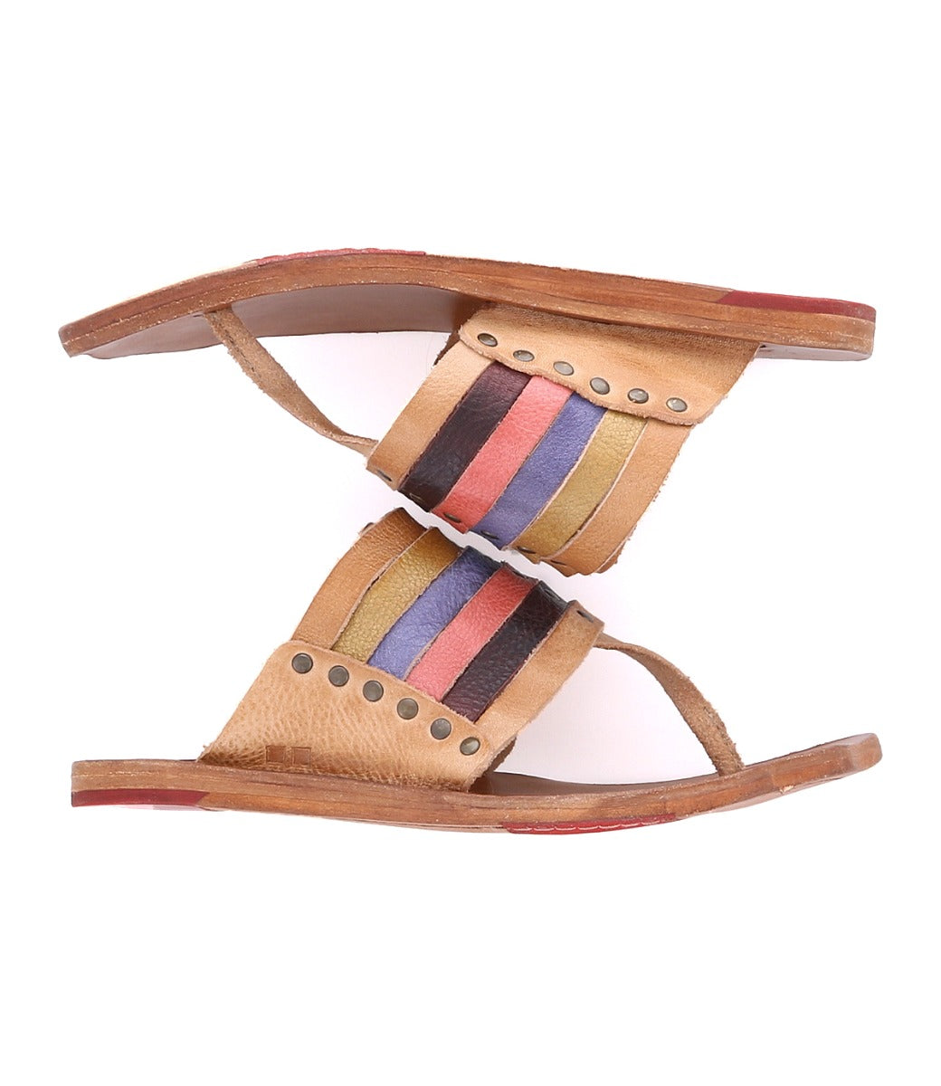 A pair of Bed Stu Nemesis women's sandals with multi-colored straps.