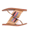 A pair of Bed Stu Nemesis women's sandals with multi-colored straps.