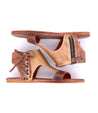 A pair of Nina women's sandals with tan straps from Bed Stu.