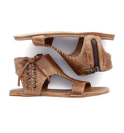 A pair of Nina sandals by Bed Stu with a zipper on the side.