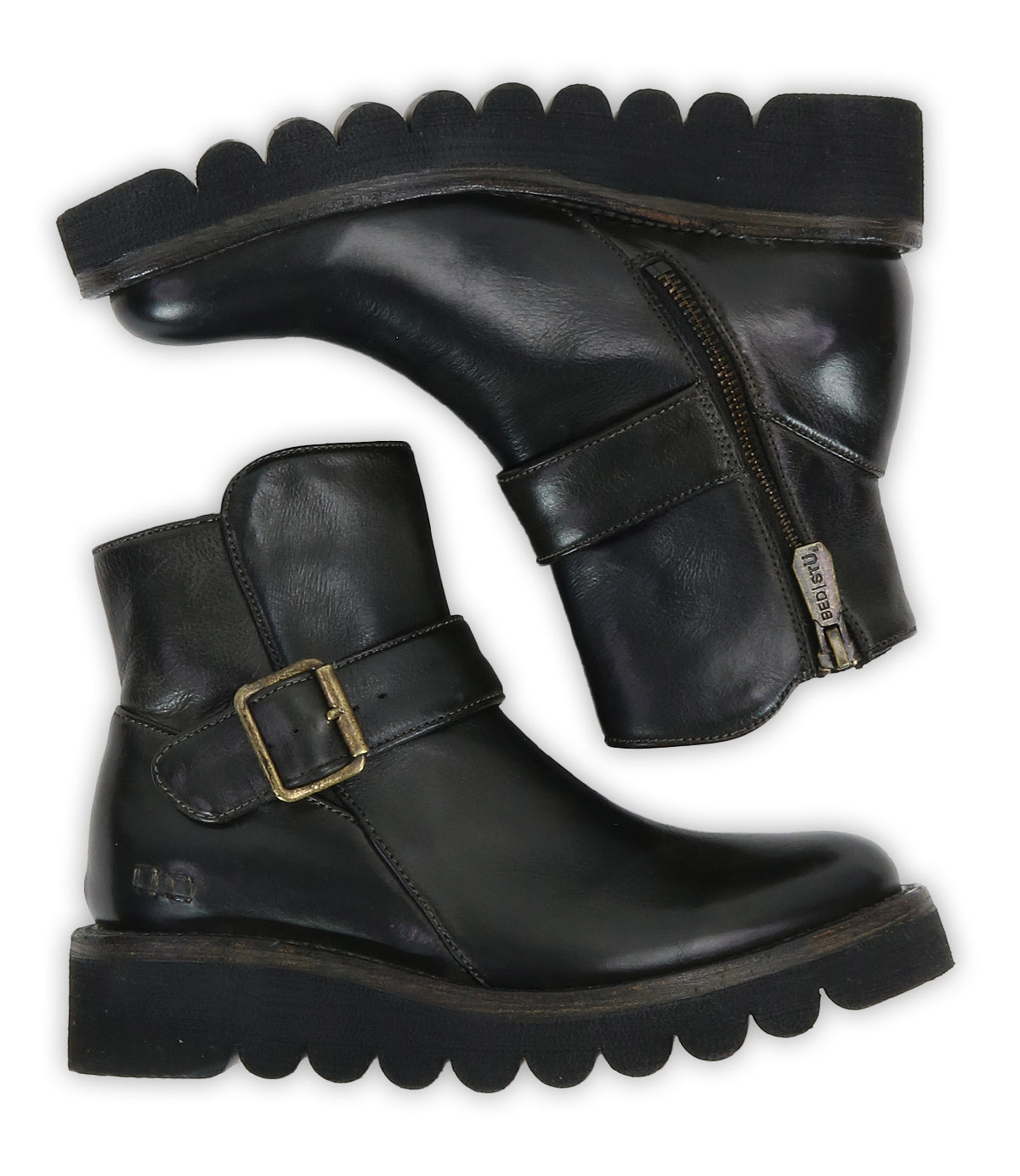Bed Stu’s Nudge II black ankle boots feature leather finishes, side zippers, an adjustable strap, and thick scalloped rubber soles, displayed side by side.