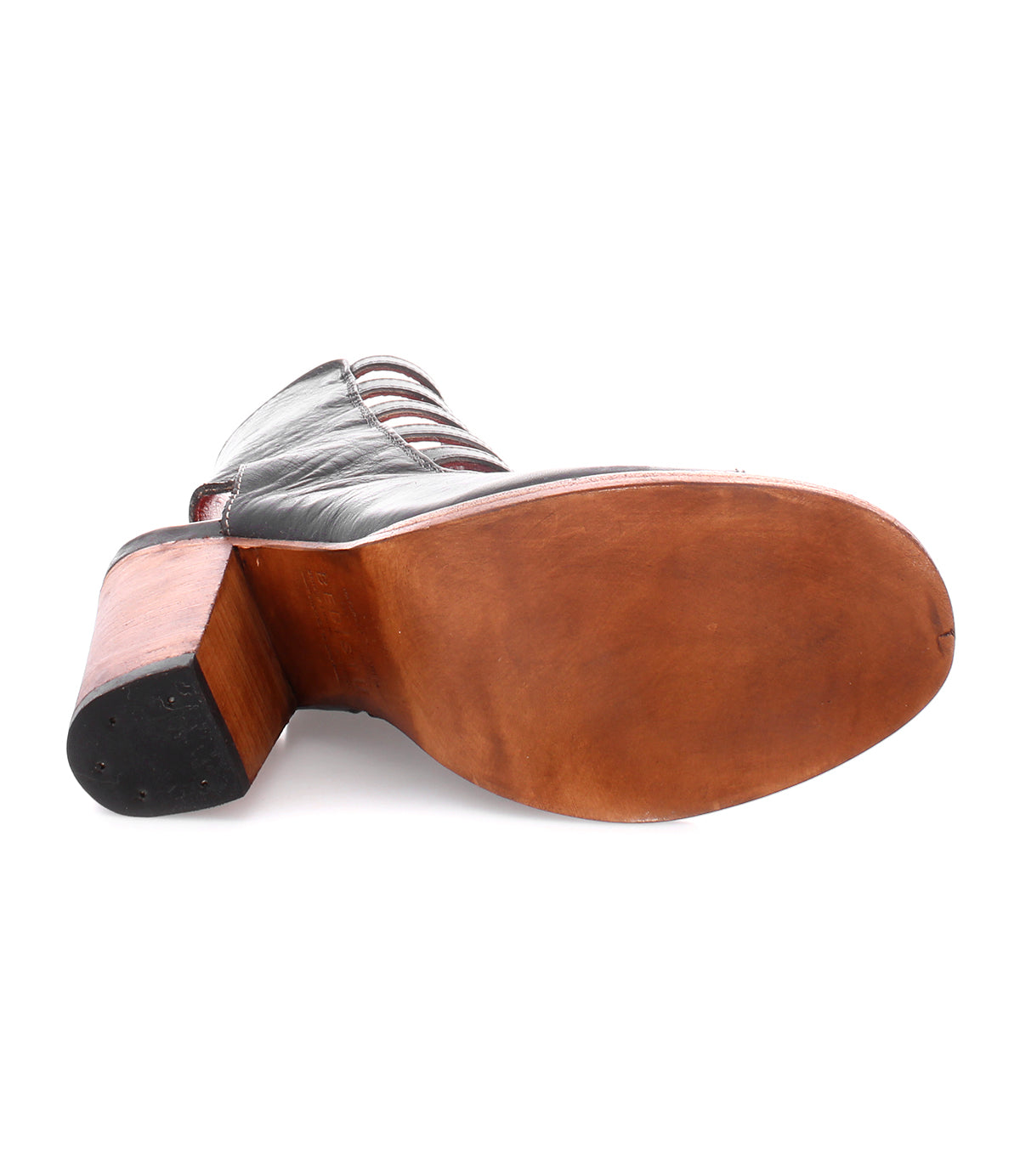 The back of a black leather peep-toe Occam heel with a wooden sole from Bed Stu.